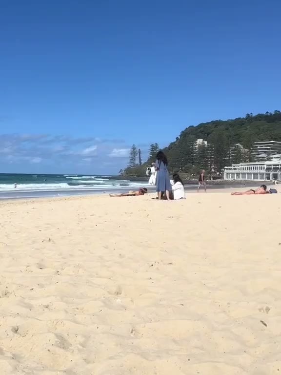 Burleigh Beach with the Pavilion and headland